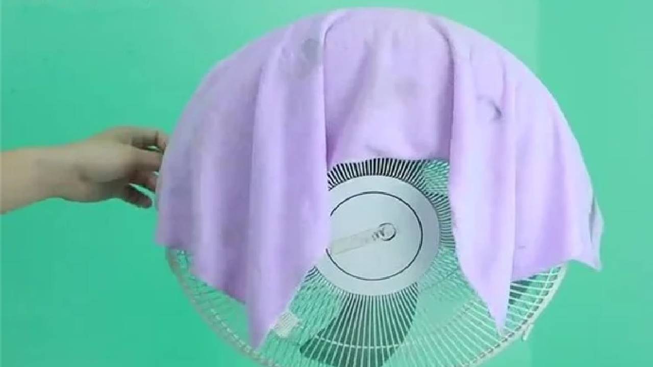 Đặt khăn lên lồng quạt có thể giúp giảm nhiệt (Ảnh minh họa)