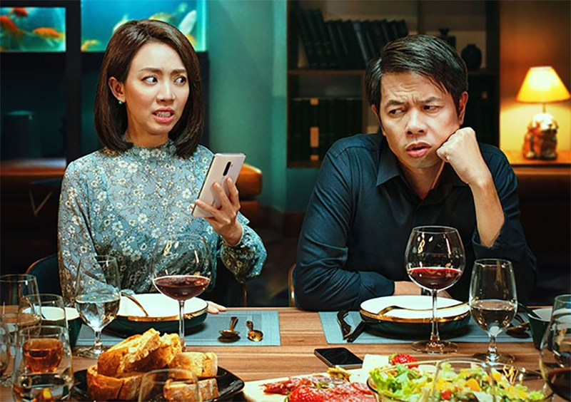 Thái Hòa và Thu Trang trong phim Tiệc Trăng Máu