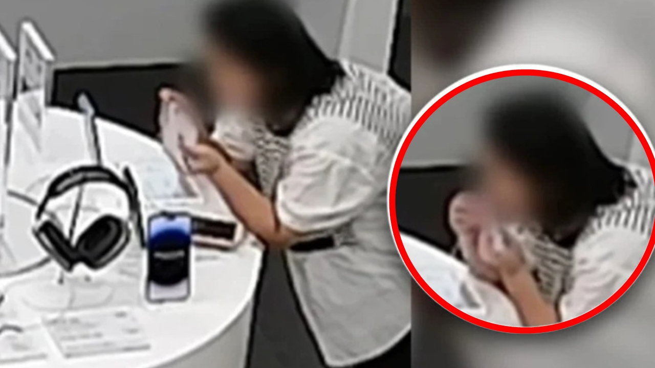 Người phụ nữ bị phát hiện đã cắn dây cáp để trộm iPhone 14.