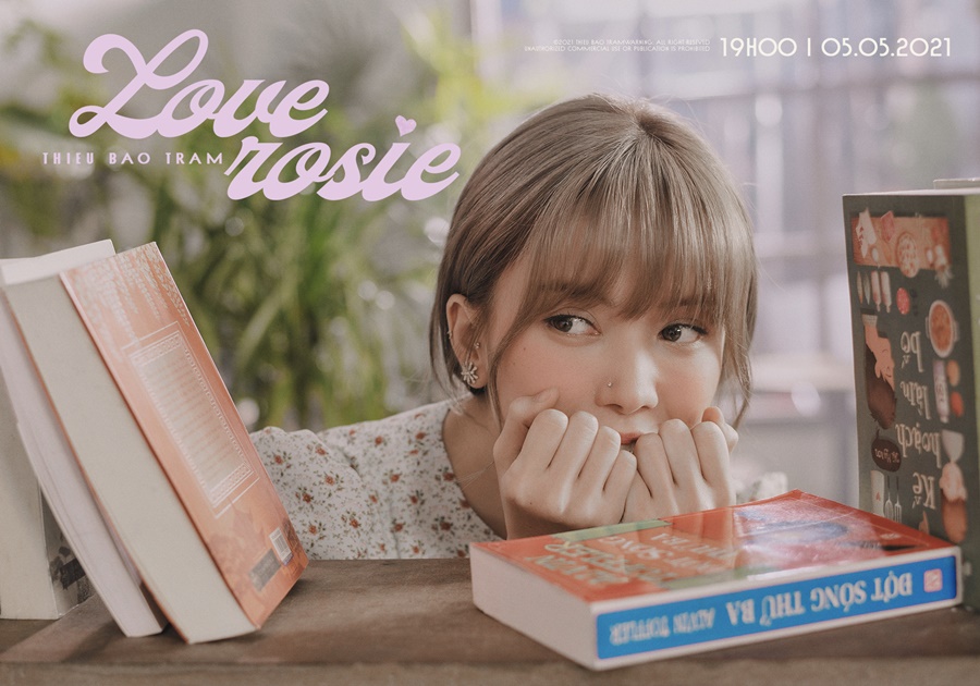 MV Love Rosie hứa hẹn sẽ là một sản phẩm âm nhạc mang nhiều năng lượng tích cực, đẹp đẽ về tình yêu từ Thiều Bảo Trâm. 