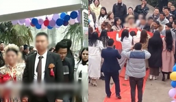 Độc lạ người phụ nữ mang băng rôn đến phá đám cưới: 'Vợ cũ chúc chồng cũ và vợ mới hạnh phúc'