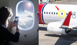 Một hành khách bị bắt khẩn cấp khi chụp hình qua cửa sổ máy bay, nguyên nhân vì sao?
