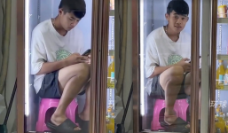 Không thể chịu nắng nóng, thanh niên Trung Quốc chui vào tủ lạnh bấm điện thoại