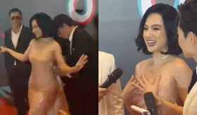 Angela Phương Trinh được 4 vệ sĩ hộ tống đến sự kiện, chơi lớn 'cởi đồ' trước mặt mọi người