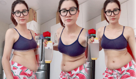 Trang Trần khoe vòng 2 ngấn mỡ, phủ nhận tin đồn mang thai