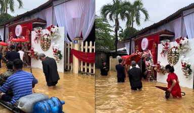 Đám cưới diễn ra trúng ngày mưa lũ, nhà trai xắn quần lội nước sang rước dâu, netizen thắc mắc chi tiết lạ