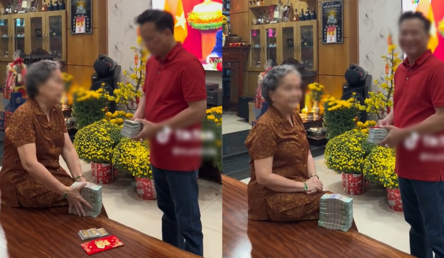 Người mẹ 'chơi lớn' lì xì con trai cả tiền Việt lẫn tiền đô, thêm 10 cây vàng khiến CĐM xuýt xoa